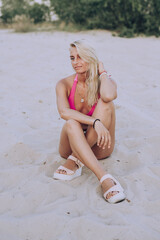 girl on the beach
 relaxing on the beach 
woman in bikini