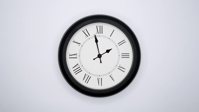 The Time On The Clock Two. White Wall Clock With Black Rim And Black Hands. Timelapse. 4k, ProRes