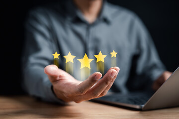 Businessman showing five star on hands, Customer satisfaction feedback review concept. Customer online service experience and business satisfaction.