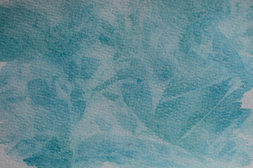 Blue watercolor abstract background on watercolor paper