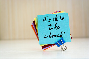 It's ok to take a break written on a memo at the office