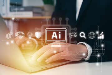 Businessman using laptop with AI technology concept, connecting smart robot AI, artificial...