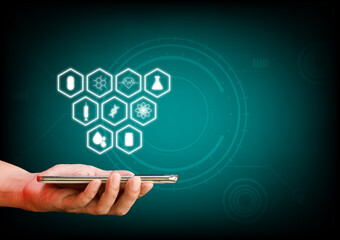 Telemedicine, medical technology, online healthcare concept. Hand holding smartphone or tablet with health icon on virtual screen on blue background. Copy space for text.