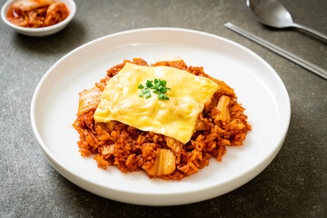 kimchi fried rice with pork and topped cheese
