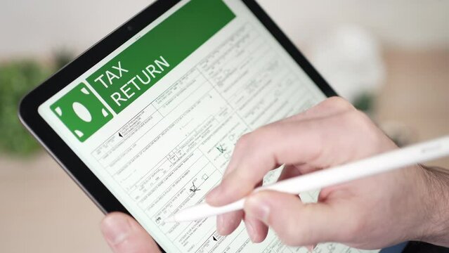 Filling a Tax Return Document Form Online on a Tablet
