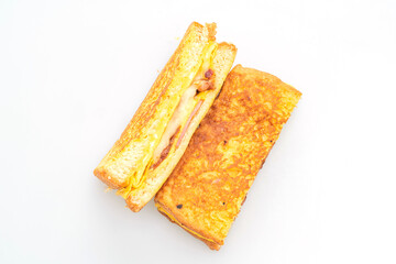French toast ham bacon cheese sandwich with egg