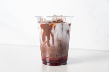 iced chocolate with milk and strawberry syrup
