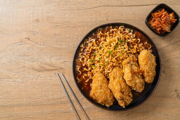 Korean instant noodles with fried chicken or Fried chicken ramyeon