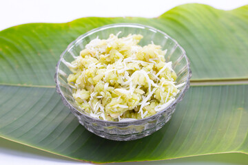 Green rice Thai dessert with coconut (Khao Mao)