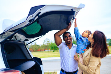 happy family departing to vacation for spending time together at the beach