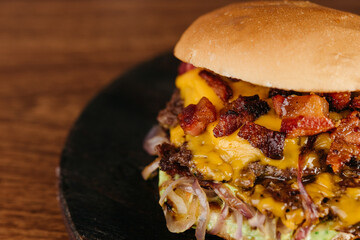 Burger - Sandwich with beef burger, mozzarella cheese, bacon, red onion and homemade mayonnaise