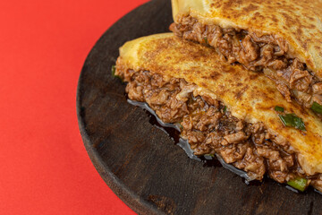 Swiss Crepe Stuffed with Pulled Pork Ribs with Salad and Tomato Sauce