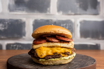 Burger - Sandwich with beef burger, mozzarella cheese, curd cheese, pepperoni sausage and mayonnaise