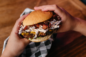 Burger - Sandwich with beef burger, mozzarella cheese, bacon, red onion and homemade mayonnaise