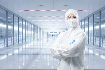 Worker wears medical protective suit or coverall suit with mask and goggles