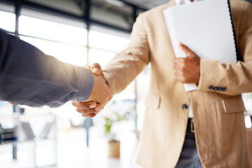 Handshake, contract deal and business partnership of a b2b meeting with shaking hands. Networking, hiring and professional negotiation of onboarding collaboration and congratulations of project - obrazy, fototapety, plakaty