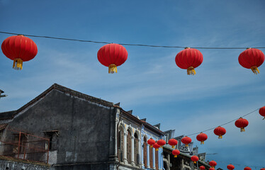 red lanterns over the heritage houses in Penang, Malaysia © BH