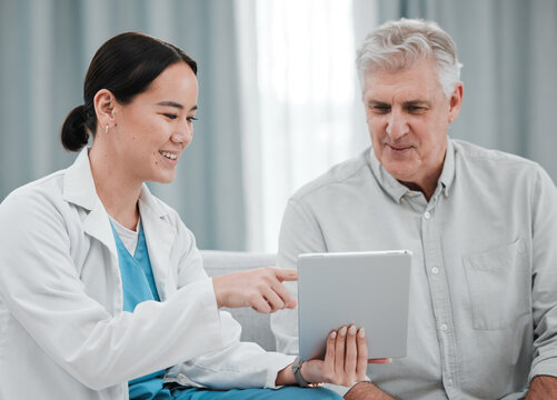 Woman Doctor, Tablet And Senior Patient Consultation For Healthcare Advice, Services And Test Results Review. Medical Professional Or Asian Person Talking Of Healthcare Data On Digital Technology