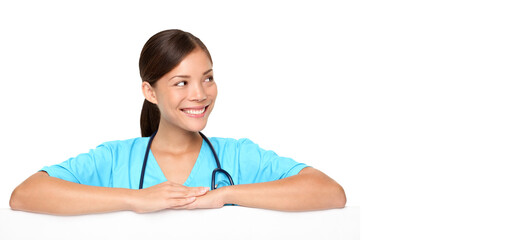 Medical sign or banner for edge. Woman nurse or young doctor in scrubs showing empty blank paper...