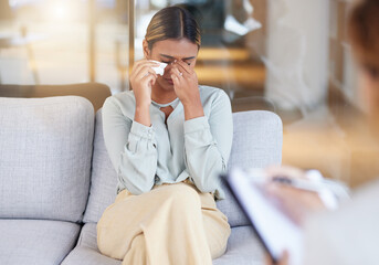 Mental health, woman and employee in therapy session, crying and conversation in office. Female,...