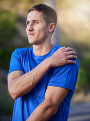 Fototapeta premium Injury, sport and man holding an arm with pain during running, exercise and strain from cardio. Health, accident and athlete runner with an injured muscle, painful body and inflammation in nature