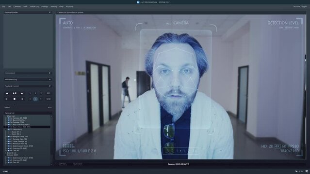 Playback CCTV camera on computer screen. Outside security camera of business office. AI program with facial recognition and personal profiles. Face scanning system. Digital surveillance and tracking.