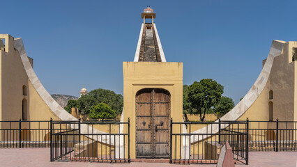 The world's largest ancient sundial Samrat Yantra at the Jantar Mantar Observatory. A curved marble...