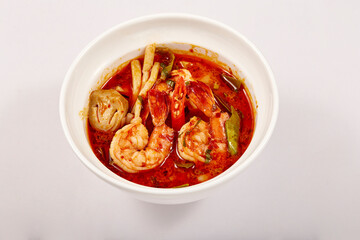 Creamy Tom Yum Kung Soup is a very popular dish in Thailand, containing of vegetables and herbs such as chili, lemongrass, lime leaves, lime and mushrooms, with hot, sour, sweet, and salty flavors.