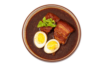 Top view of Egg and Pork in Sweet Brown Sauce in bowl isolated on white background, 2 boiled eggs, braised pork and cilantro. popular food in asia.