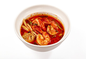 Creamy Tom Yum Kung Soup, That is a very popular dish in Thailand, containing of vegetables and herbs such as chili, lemongrass, lime leaves, lime and mushrooms.