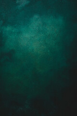 Matte green texture or background with stains, waves and grain elements. Image with place for text. Template for design - obrazy, fototapety, plakaty