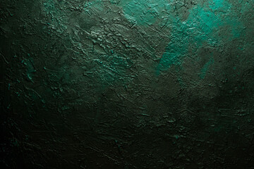Deep emerald green texture or background with stains, waves and grain elements. Image with place for text. Template for design