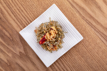Stir-fried dried anchovies with walnuts