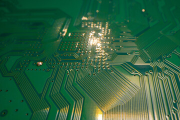 Electronic circuit board with semiconductors chip. Electronic motherboard card. Circuitry and close-up on electronics. Background of electronics on board electrical circuits, technology texture.