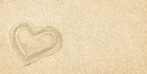 Fototapeta na wymiar Sand. Texture, surface of sea sand. A heart drawn in the sand. Natural background. Close-up. View from above. Smooth. Space for text. Copy space