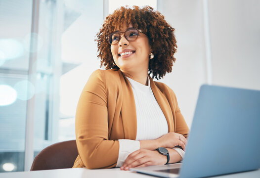 African woman at office, glasses on face with laptop and thinking of future of corporate in South Africa. Happy black business person with spectacles at work, confident in career and professional job