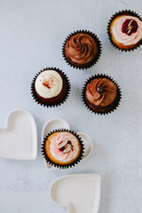 Delicious Chocolate, red velvet, raspberry cupcakes with white hearts
