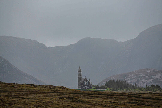 Church among high hills in Ireland