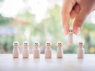 Select wooden business figure with happy face and 5 star,Customer service rating experience, feedback emotion and satisfaction survey.