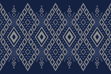 Indigo navy blue geometric traditional ethnic pattern Ikat seamless pattern border abstract design for fabric print cloth dress carpet curtains and sarong Aztec African Indian Indonesian 