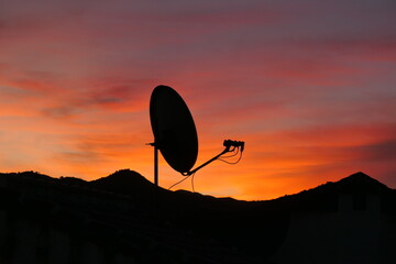 Satellite dish at dawn