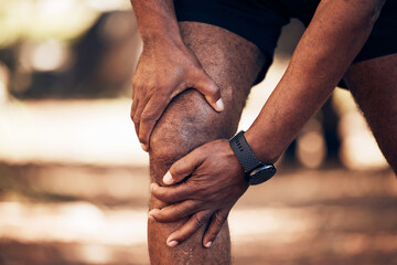Knee pain, senior hands and injury in nature after accident, workout or training. Sports, athlete...