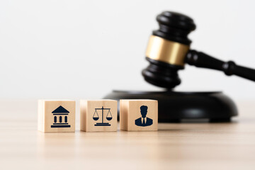 icon of a Law lawyer, court, and judge on a wooden block and gavel on a table for a Labor law of...