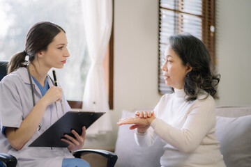 Concerned senior old patient patient talks with healthcare professional.