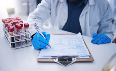 Blood test, science documents and hands in laboratory for healthcare results, research or review...
