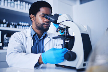 Microscope, science laboratory and black man research medical analysis, review and biotechnology....