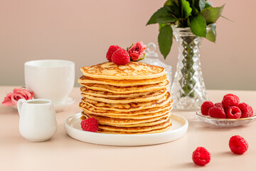 summer healthy breakfast with Pancakes with strawberries on beige background 