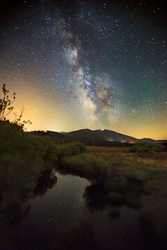 The Milky way shines in the night sky over Truckee's Martis Valley and Northstar's Mt. pluto