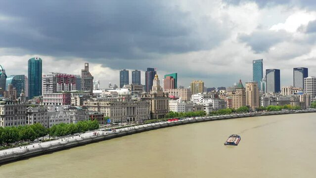 Aerial Panning Shot Of The Bund In Historical District Of City, Drone Flying Forward Over Huangpu River - Shanghai, China