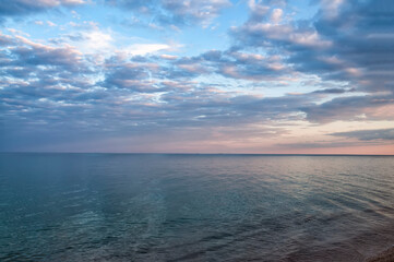 Calm evening morning sea with beautiful clouds.Calmness of nature in the early morning.